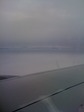 Под крулом самолета!