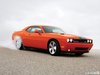 1217439900_2008-dodge-challenger-srt8-burnout-side