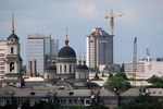 город